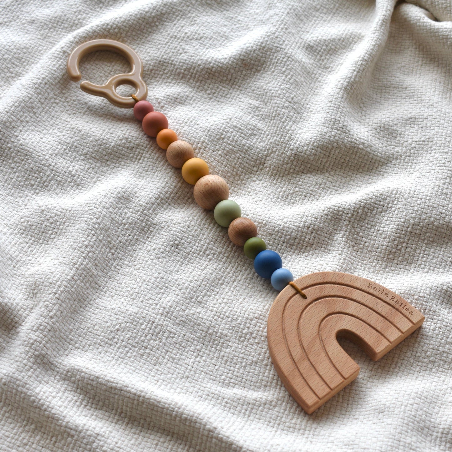 Wooden Rainbow Pram Toy
