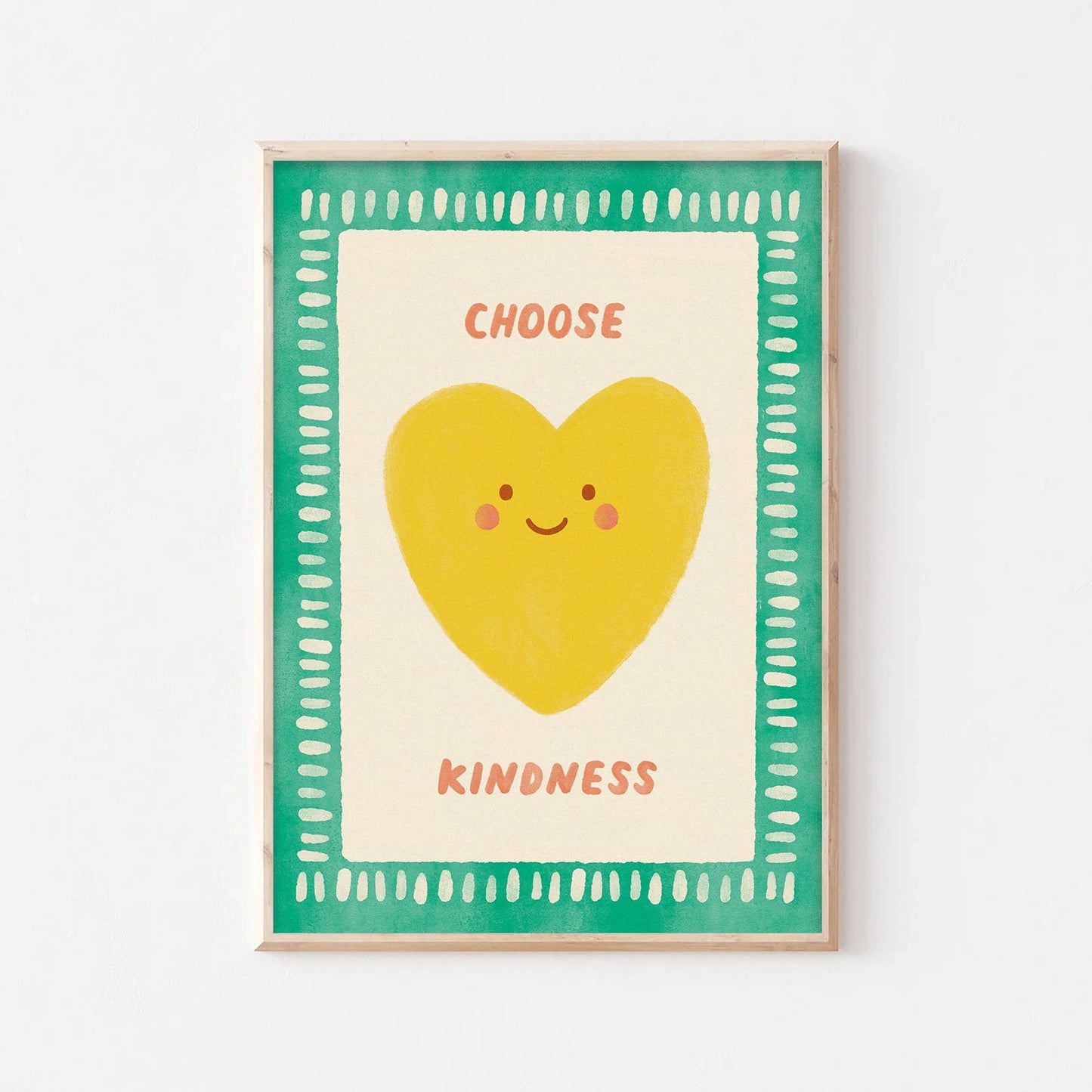 Framed poster with a yellow heart and text 'Choose Kindness' on a white background