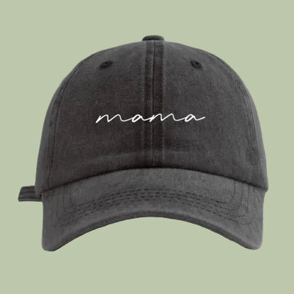 Black cap with 'mama' embroidered on a white background