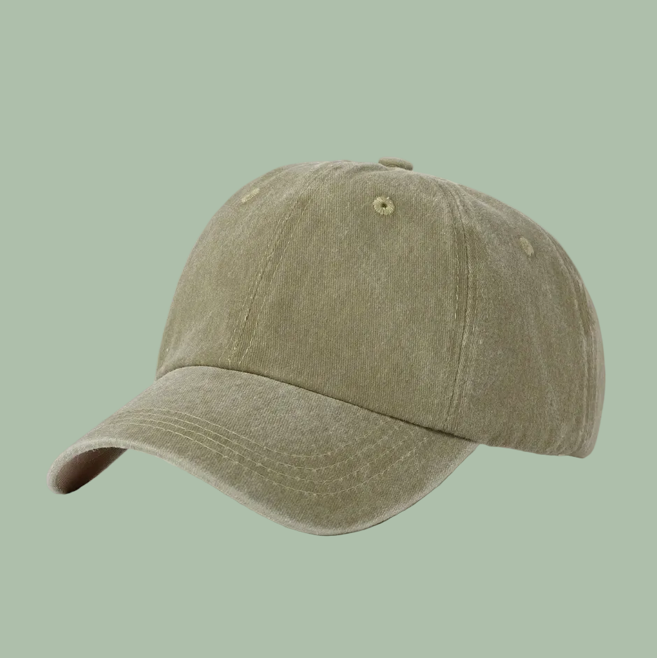 Beige baseball cap  on a light gray background