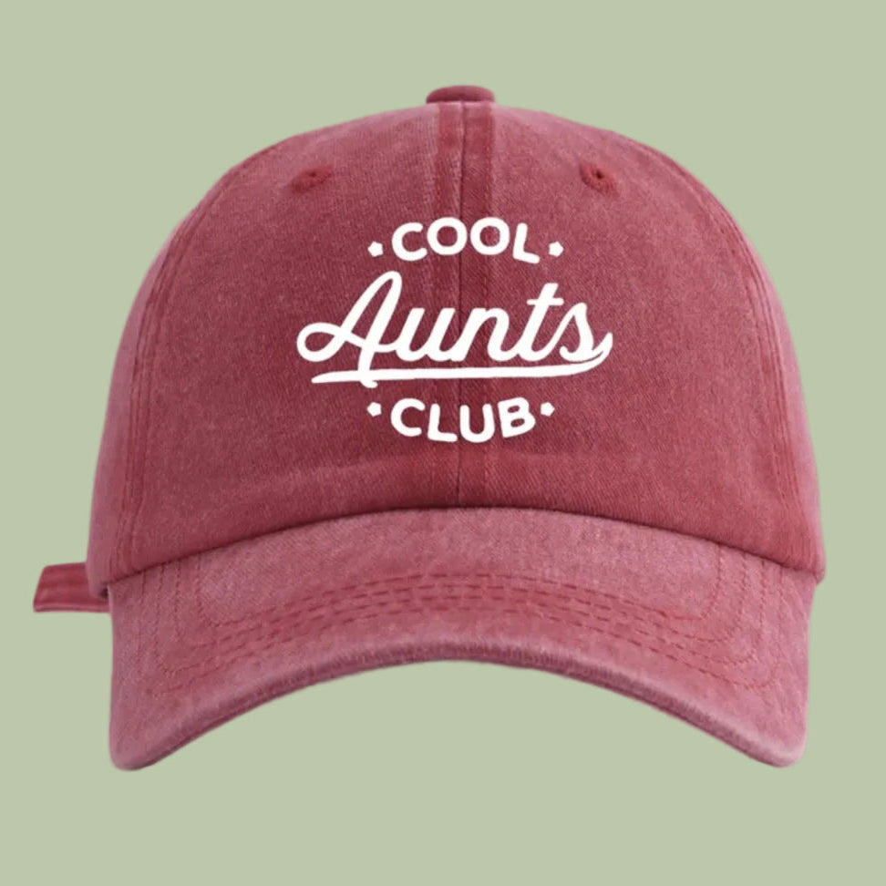 Maroon cap with 'Cool Aunts Club' text on a white background
