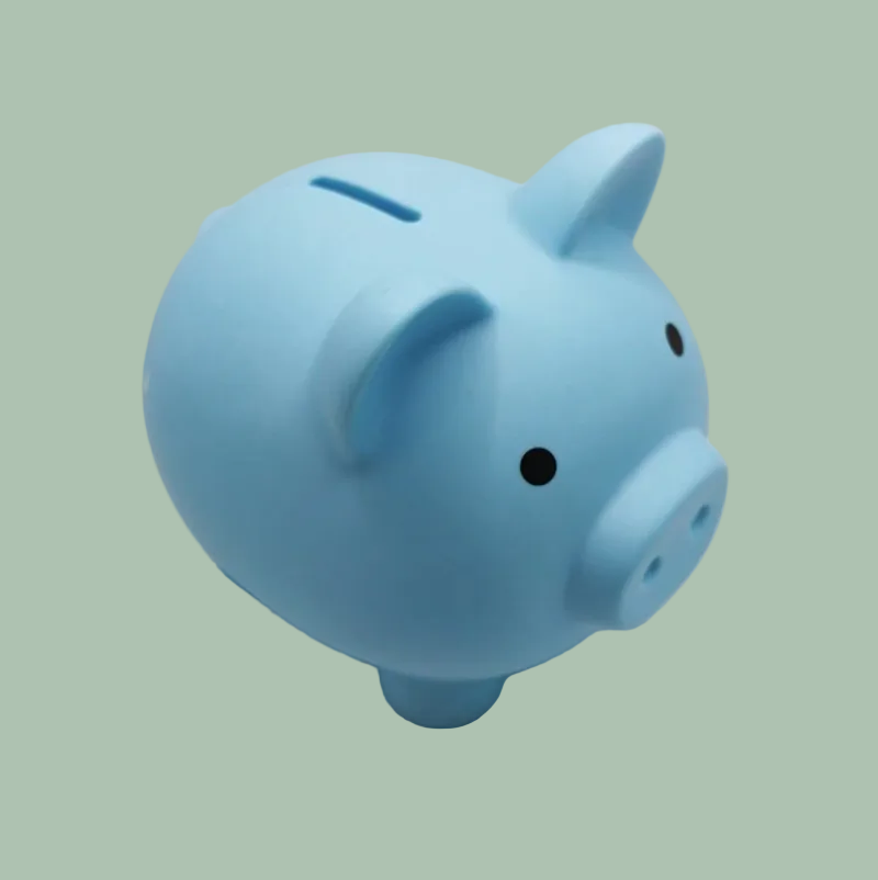 A light blue pig-shaped piggy bank with a coin slot on top,