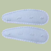 Light blue oval-shaped objects with textured surface on a white background