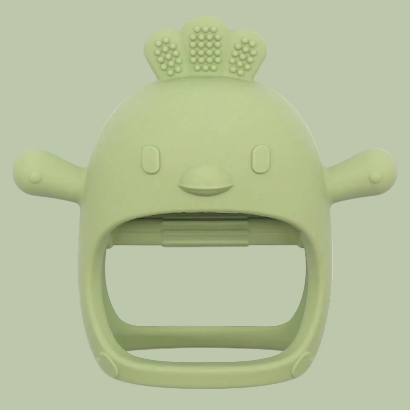 Green hedgehog-shaped baby teether on a white background