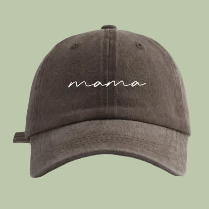 Dark gray cap with 'mama' embroidered on a white background