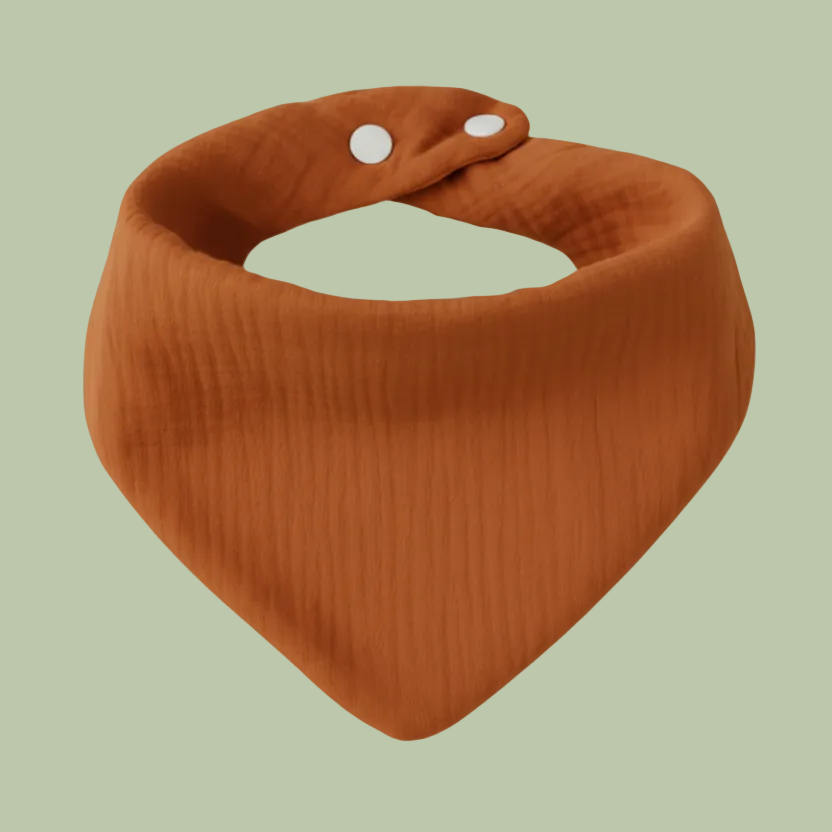 Brown bandana bib on a light green background
