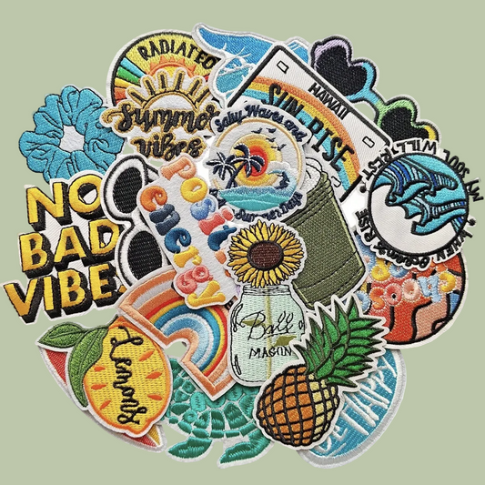 Collection of colorful embroidered patches with various designs on a white background