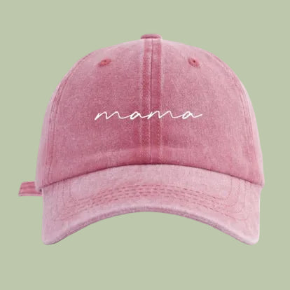 Pink cap with 'mama' text on a white background